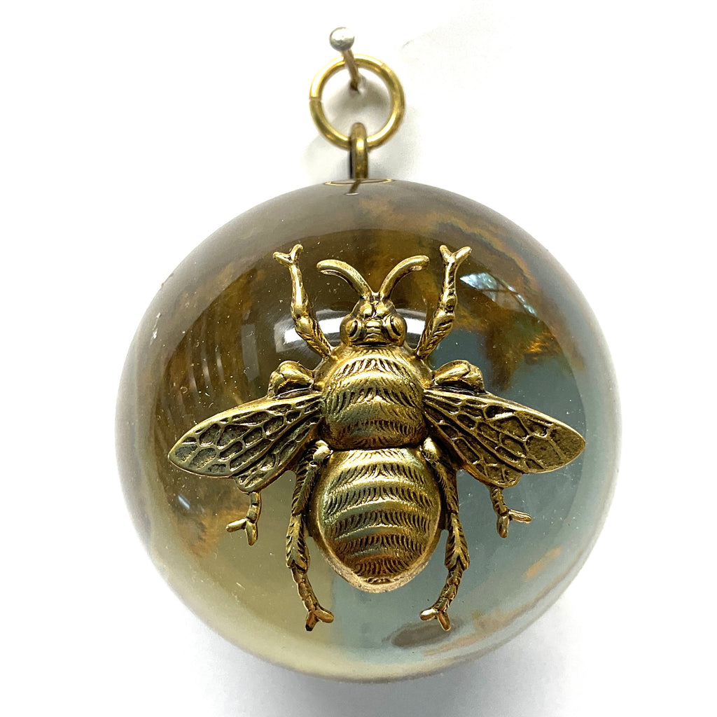 Acrylic Orb with Grande on Gold Mylar (2.5” wide)